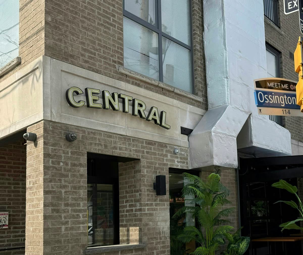 Newly installed storefront sign on an Ossington retail unit