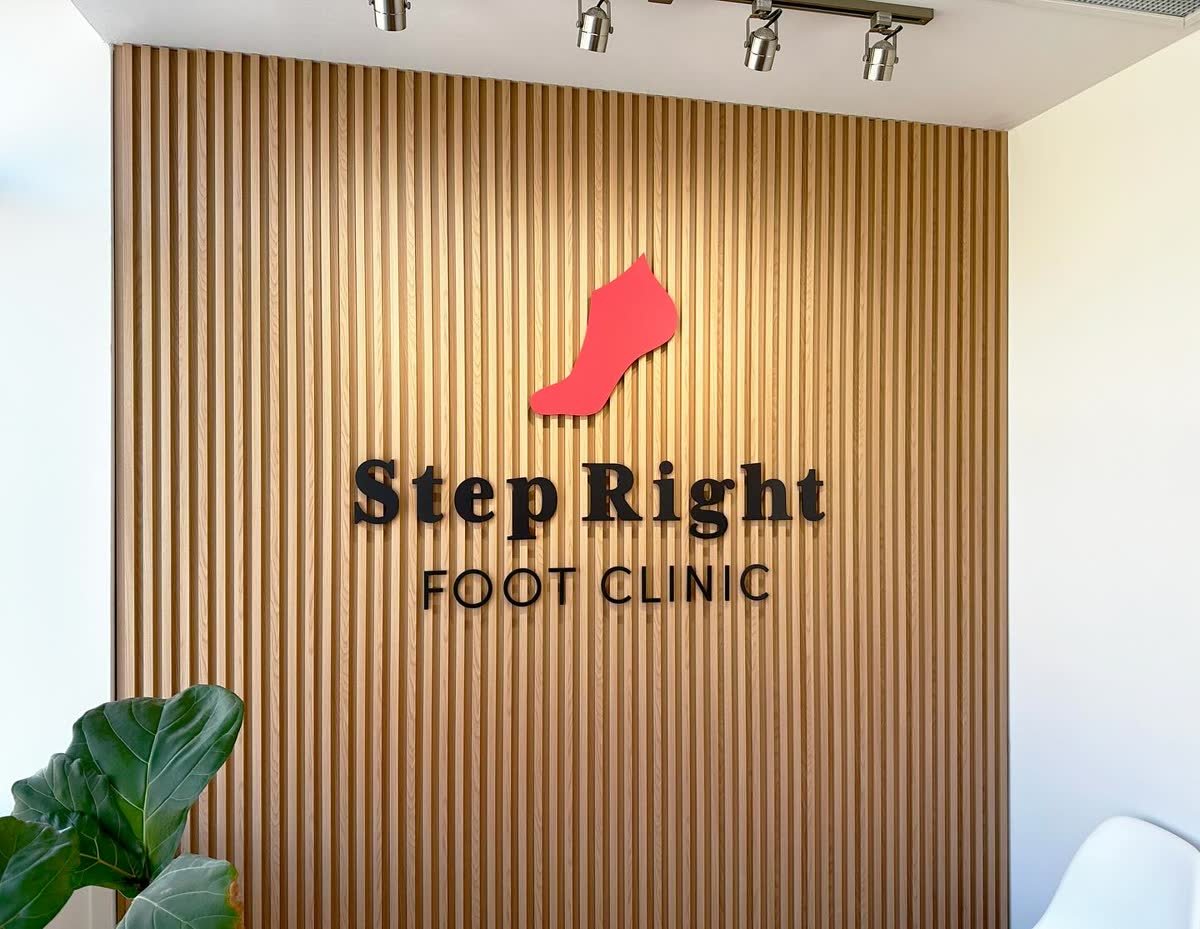 Exterior aluminum sign with flat cut acrylic letters on a clinic
